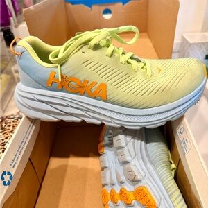 SOLD.    Hoka Citrus and Sky Blue Athletic Shoes